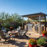outdoor-living-space-in-arizona-featuring-a-patio-outdoor-kitchen-and-drought-tolerant-plants-f5ce7c3d-e5f0-477a-b9c6-001e7846d3bf.webp Outdoor living space in Arizona featuring a patio, outdoor kitchen, and drought-tolerant plants